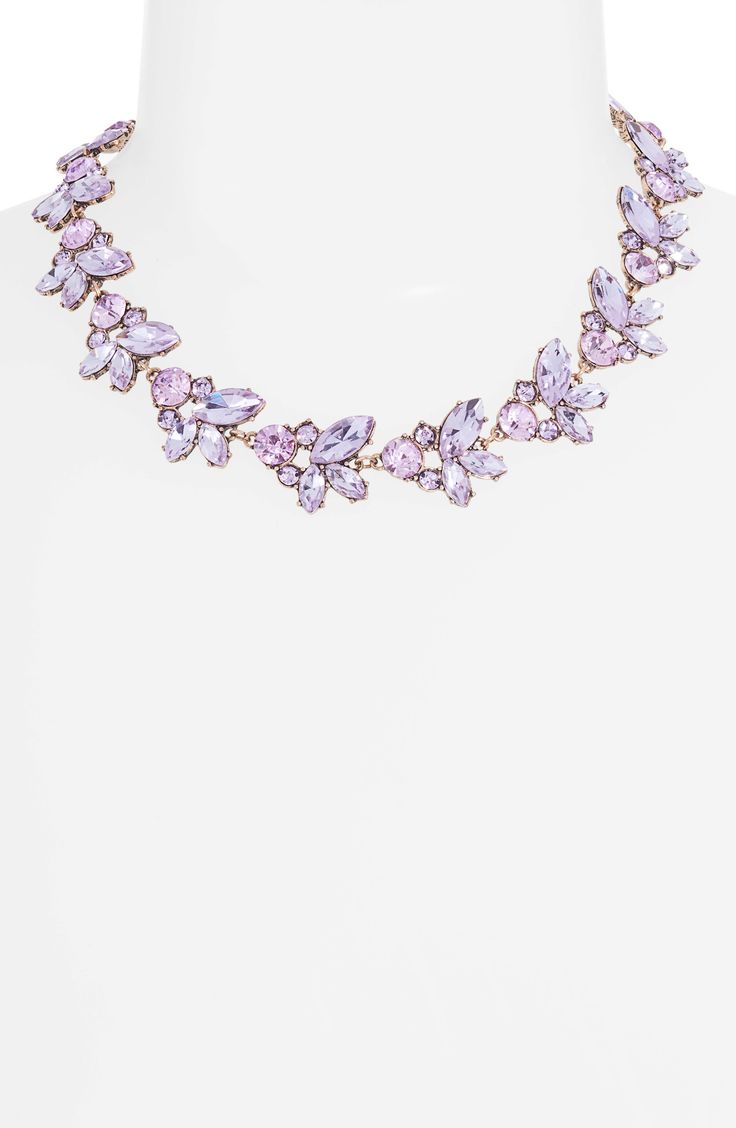 Clusters of sparkling crystals dazzle a statement-making necklace that sits elegantly above your collarbone. 17" length; 3" extender Lobster clasp closure Goldtone plated/glass Imported Lavender Crystal Jewelry For Party, Statement Collar, Statement Collar Necklace, Bridal Choker, Topaz Color, Statement Choker, Collar Bone, How To Make Necklaces, Lavender Color