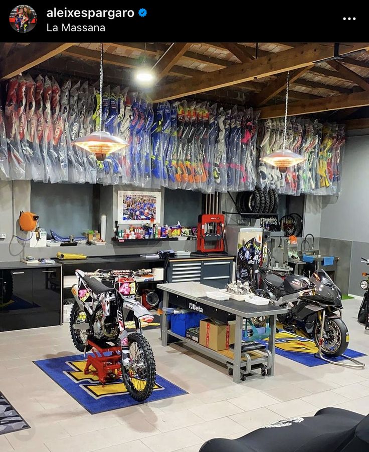 a room filled with lots of different types of motorcycles