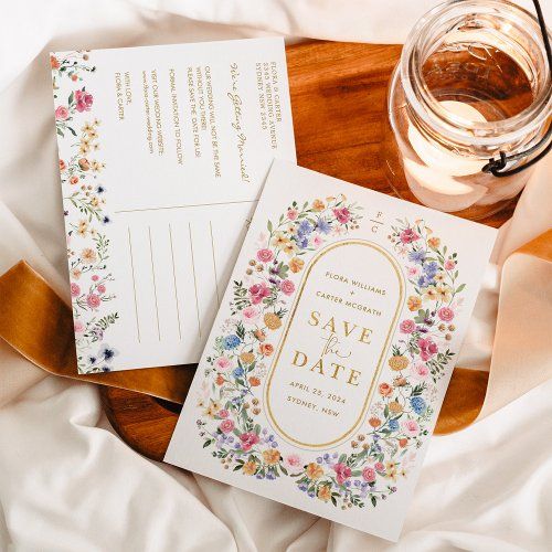 wedding stationery and save the date cards on a wooden platter with a jar of honey