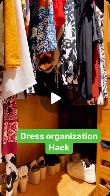 a closet filled with clothes and shoes next to a green sign that says dress organization hack