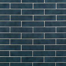 a blue brick wall with white lines on it