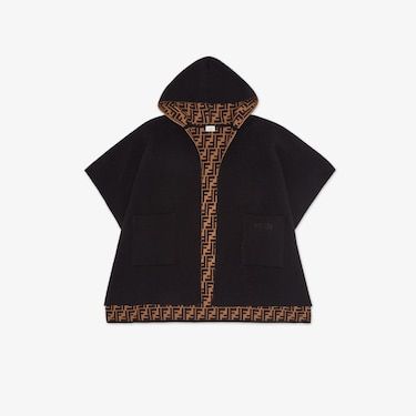 Wool and cashmere knit reversible junior cape. Plain black with large front pockets on one side and all-over tobacco FF brand logo on the other. Made in Italy. Size Iv