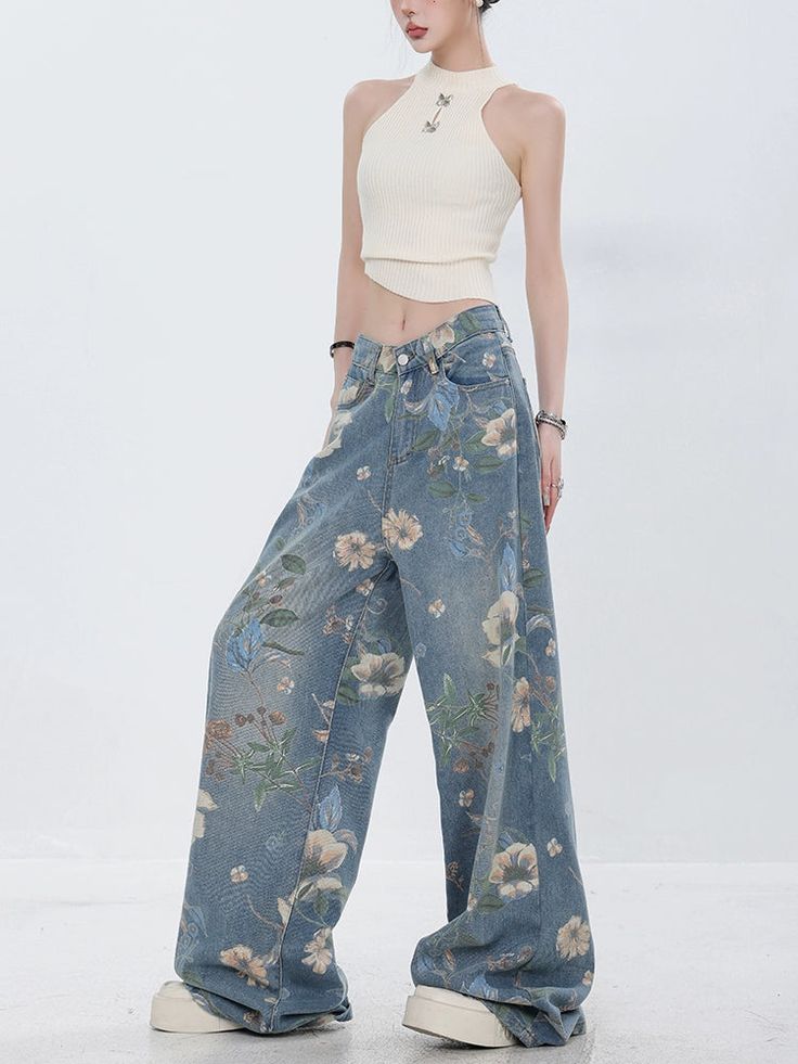 Cute denim pants with a floral design that attracts attention.

This piece is a well-balanced mix of casual and girly elements.

The thick wide silhouette does not emphasize the line of your legs and makes it easy to maintain balance.
◾️Model
Height/Weight：163cm(64.1in)/44kg(97.0lb)
Fitting Size：S





Cm
(inches)

Length
Waist
Hip


S
104(40.9)
62(24.4)
104(40.9)


M
106(41.7)
66(25.9)
108(42.5)


L
108(42.5)
70(27.5)
112(44.0)


XL
110(43.3)
74(29.1)
116(45.6) Casual Wide Leg Pants With Floral Print, Relaxed Fit, Casual Floral Print Wide Leg Pants For Spring, Casual Wide Leg Floral Print Pants, Relaxed Fit Floral Print Jeans In Denim, Relaxed Fit Floral Print Denim Jeans, Relaxed Fit Floral Print Jeans, Vintage Wide Leg Floral Print Pants, Vintage Wide Leg Pants With Floral Print, Casual Floral Print Cotton Wide Leg Pants