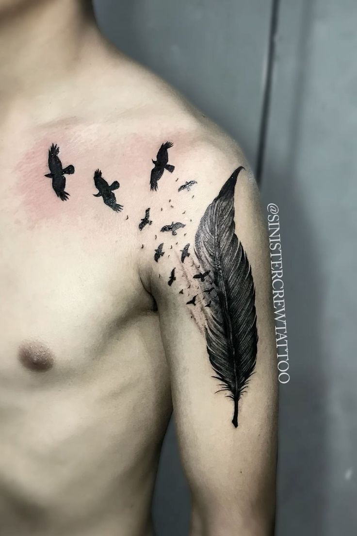 a man's chest with birds and a feather on it