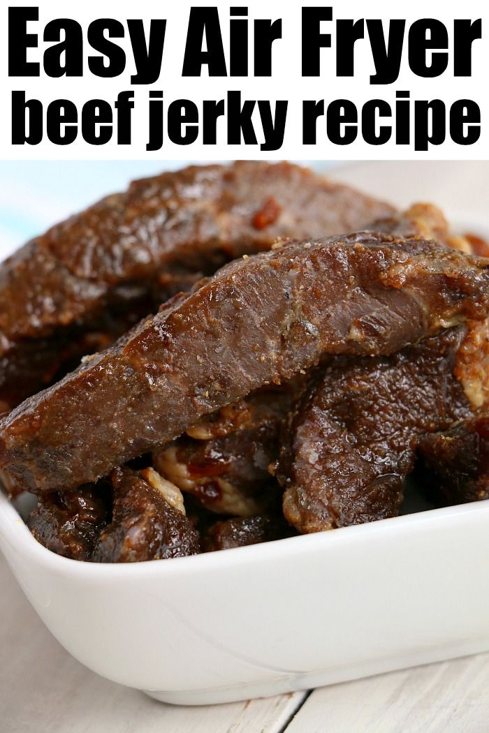 an easy air fryer beef jerk recipe in a white dish with text overlay