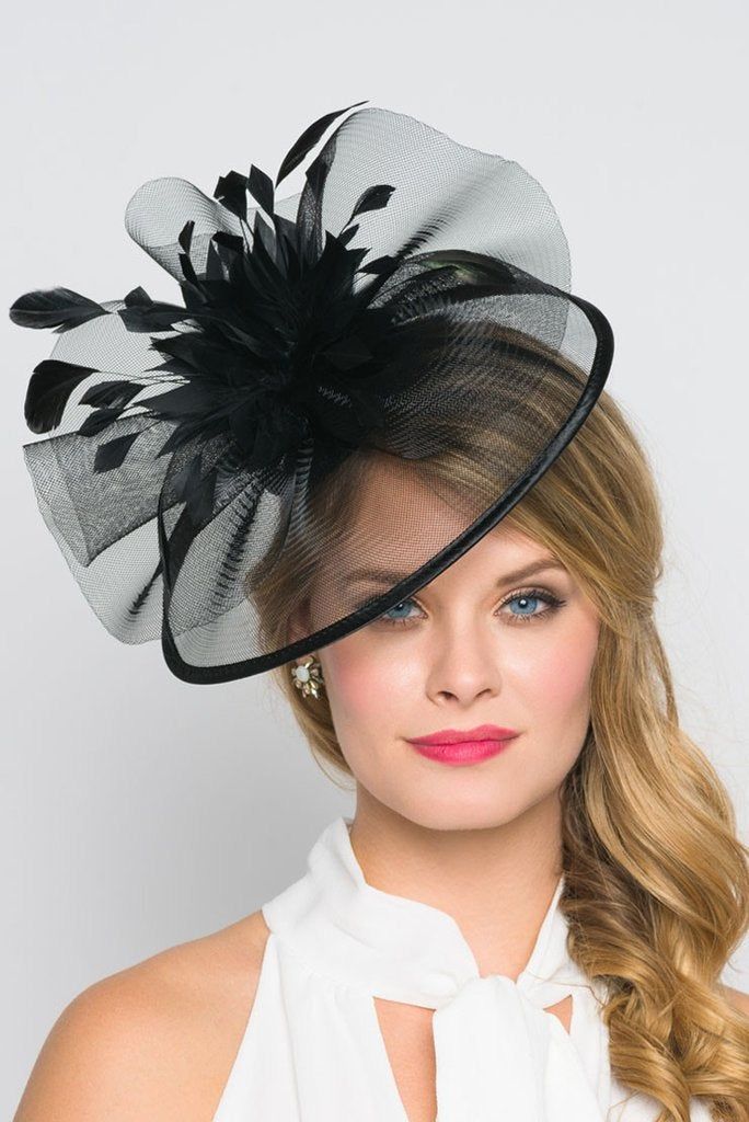 You are a picture of glamorous sophistication when you put on this romantic fascinator! Modern with a vintage touch, this elegant horse hair mesh base adorns a beautiful bouquet of soft feathers. A soft satin trim offers and allure that's simply breathtaking. - Horse hair mesh - Easy wear slip-on headband Chic Black Wedding Headpiece, Fitted Black Fascinator With Feather Trim, Elegant Black Feather Trim Costume Hat, Elegant Evening Headpieces With Ostrich Feathers, Elegant Black Costume Hat With Feather Trim, Evening Feather Hat Headpiece, Evening Fascinator With Feather Trim, Elegant Ostrich Feather Headpieces For Races, Elegant Fitted Ostrich Feather Headpieces