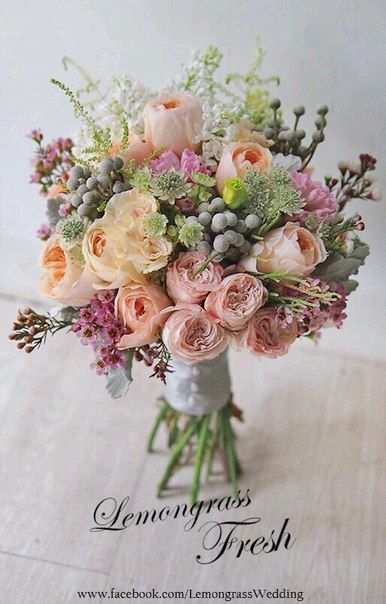 a bouquet of flowers sitting on top of a table