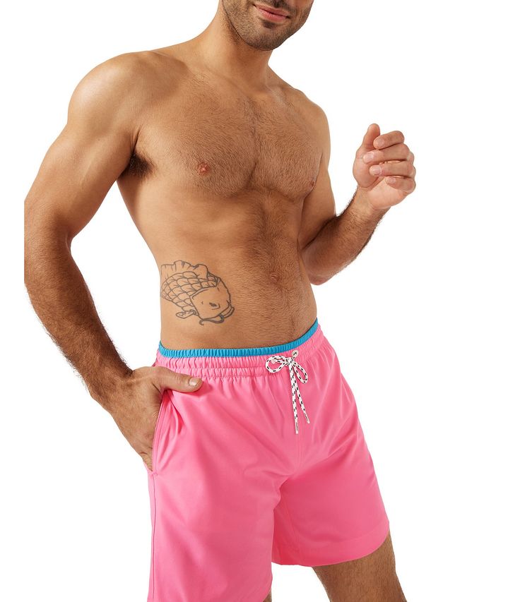 From Chubbies&#x2C; these swim trunks feature:Classic fitElastic waistband with built-in drawstringZippered back pocketUltra quick-drying shellMesh basket linerApprox. 5.5" inseamPolyester/spandexMachine wash/tumble dryImported. Pink Summer Swim Trunks For Water Sports, Pink Swim Trunks For Water Sports, Pink Swim Trunks With Elastic Waistband For Beach Season, Pink Swim Trunks With Elastic Waistband, Pink Swim Trunks With Elastic Waistband For Beach Wear, Pink Short-length Swimwear For Pool, Sporty Pink Swim Trunks For Pool, Pink Short-length Swim Trunks For Sports, Pink Short Length Swim Trunks For Sports