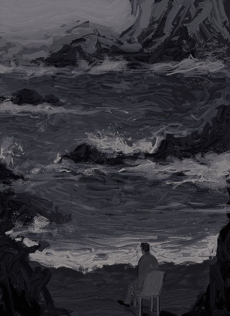 a man sitting in a chair looking out at the ocean with waves crashing on him