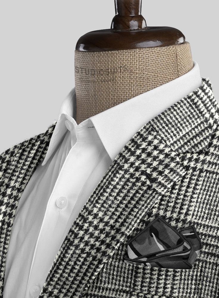 Convey an iconic stance that highlights finesse by donning our Harris Tweed Classic Glen Suit. However, the suit is designed with pure wool fabric, representing thick, generous feelings yet pursuing a robust nature that tackles the cold weather moods with a checks pattern over a black and white tone. Finally, Narrow the suave focus with an elegantly tailored suit that devotes significant warmth with a stylish personality to make a bold statement on any occasion. 
 
 Look Includes  Harris Tweed C Winter Tweed Semi-formal Suit, Tweed Suits For Winter Semi-formal Occasions, Tailored Tweed Blazer With Houndstooth Pattern, Plaid Wool Suit With Notch Lapel, Fall Houndstooth Suit With Lapel Collar, Business Tweed Sport Coat With Houndstooth Pattern, Business Tweed Houndstooth Sport Coat, Formal Houndstooth Sport Coat For Winter, Winter Formal Houndstooth Sport Coat