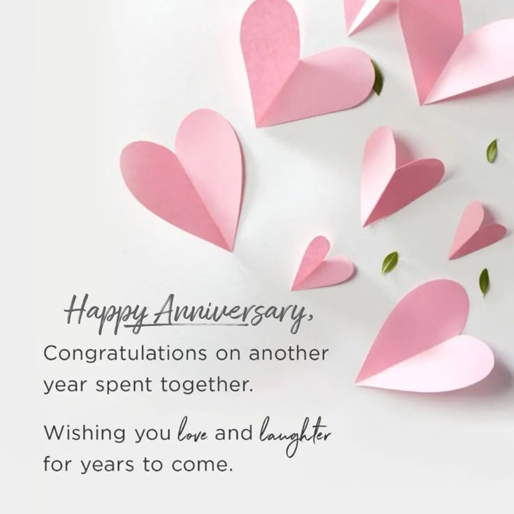 happy anniversary card with pink paper hearts and congratulations message for husband or wife on valentine's day