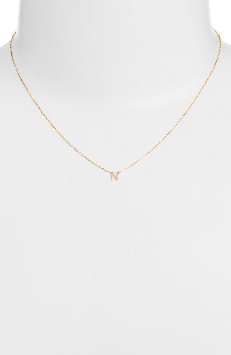 Personalize your stack with this layering-friendly necklace centered with a dainty pendant of your favorite initial filled with 14-karat yellow gold. 16" length 14k-gold fill Made in the USA Dainty Necklace Stack, L Initial Necklace, Jordan Year, L Initial, Necklace Stack, 2025 Wedding, Gold N, Wedding Couple Poses, Dainty Pendant