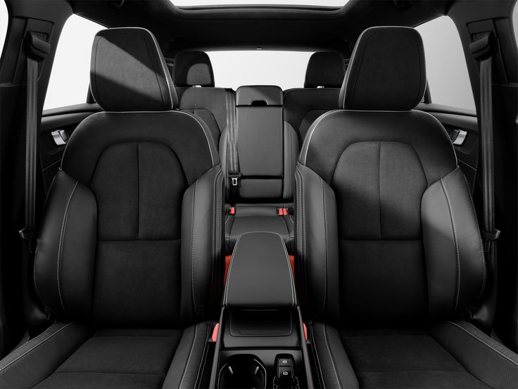 the back seats of a car with black leather