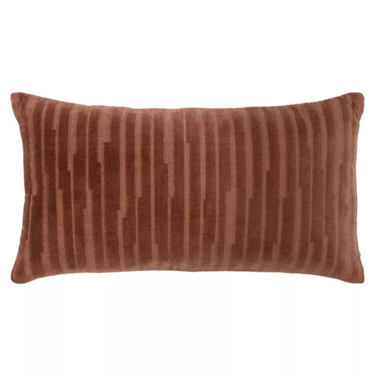 a brown striped pillow on a white background