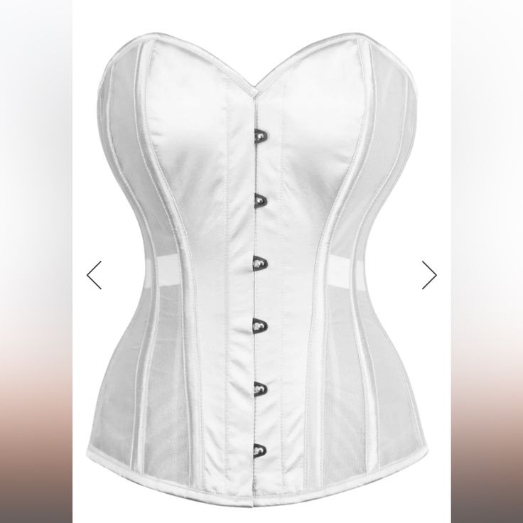 Size 22”- Suitable For 25-26” Natural Waist. Our Satin And Mesh Overbust Corset Makes The Perfect Choice For Discreet Waist Reduction Under Your Clothes. The Sheer Mesh Panels Let Skin Breathe Whilst Camouflaging Your Shapewear. The White Satin Makes This A Popular Design For Brides And Honeymooners And Offers A Waist Reduction Of Up To Four Inches. The Integral Steel Bones Are Covered In Fabric, Combining Strong Control With Comfort And A Sleek Silhouette. Style: Regular Length,Overbust Corset Features: Ribbon Lacing,Steel Busk,Mesh Panels Colour: Ivory Achievable Waist Reduction: 3-4" Sweetheart Bustline Fully Adjustable Structured Corset With Criss Cross Lacing Front And Back Modest Fitted White Corset, White Satin Underbust Corset, White Satin Corset, Structured Corset, Gingham Jacket, Overbust Corset, Bow Detail Dress, Denim Maxi Skirt, Free People Intimates