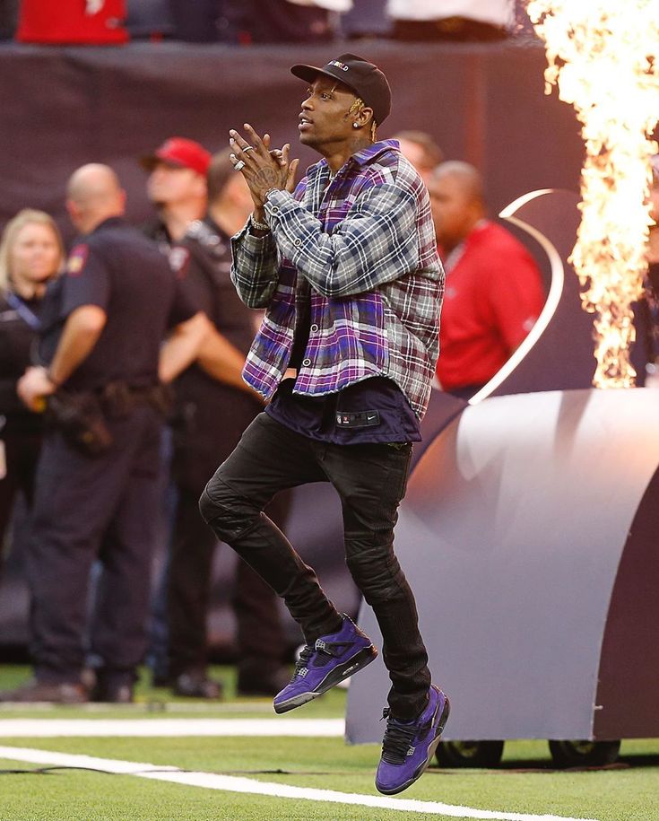 Travis Scott wearing Travis Scott Merch Astroworld Cap, Natasha Zinko Plaid Shirt Jacket, Nike NFL Houston Texans Game Football Jersey, Balmain Black Coated Biker Jeans, Nike Air Jordan 4 Cactus Jack Travis Scott Outfits, Travis Scott Fashion, Travis Scott Merch, Rapper Style, Techwear Fashion, Nba Fashion, Black Men Street Fashion, Dope Outfits For Guys, Men Street Fashion