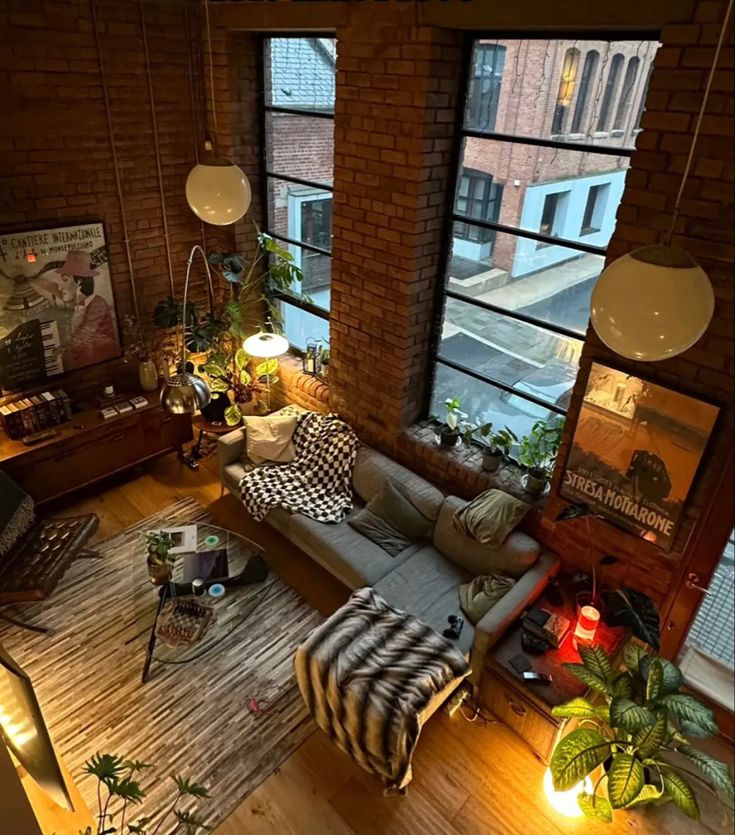 an overhead view of a living room with lots of windows