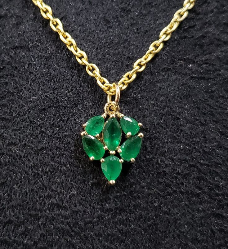 1. Emerald 14k Gold Pendant 2. Made to Order 3. Gemstone - Emerald 4. Jewelry Type - Pendant 5. Total weight - 1.171 Gram Approx 6. Emerald Weight - 1.00 Carats 7. Gold Weight - 0.971 Grams Approx. 8. Emerald Size - Mix 9. Gold Purity - 14k 10. Pendant Bails Size - 5 mm 11. Zambian Emerald 12. Ready to dispatch in 1 - 2 days. 13. Handmade Items 14. AAA Quality Pendant 15. 1 Quantity Available 16. Inclusion based Pictures are taken under natural and day light. Fine Jewelry In 14k Gold With Stones, Elegant Green Gemstones In 14k Gold, Fine Jewelry With 14k Gold And Stones, Fine Jewelry In Yellow Gold With Stones, Exquisite Yellow Gold Gemstones For Gifts, Yellow Gold Fine Jewelry With Stones, Briolette Emerald Necklace For Formal Occasions, Formal Emerald Briolette Necklace, Formal Briolette Emerald Necklace