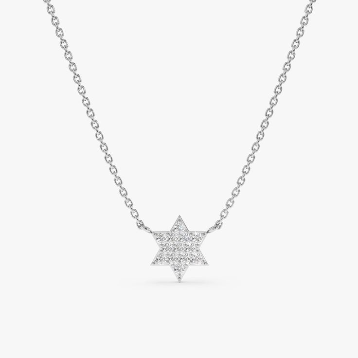 Shlomit This stunning necklace features a Star of David pendant, shimmering with sparkling diamonds. The Star of David is a widely recognized symbol of Judaism, and this necklace offers a beautiful way to celebrate your faith or heritage in style. The pendant is crafted from 14k yellow gold (available in white or rose gold) and features a classic six-pointed star design accented with sparkling diamonds. The diamonds add a touch of radiance and timeless elegance, making this necklace a perfect ac Elegant Cubic Zirconia Necklace With Star Charm, Fine Jewelry Cubic Zirconia Star Necklace, Diamond Star Charm Pendant Necklace, Fine Jewelry Star Of David Necklace With Star Charm, Sterling Silver Star Of David Fine Jewelry Necklace, Elegant Diamond Necklace With Star Of David Charm, Luxury Diamond Necklace With Star Charm, Star-shaped Brilliant Cut Necklace For Gift, Star-shaped Brilliant Cut Necklace