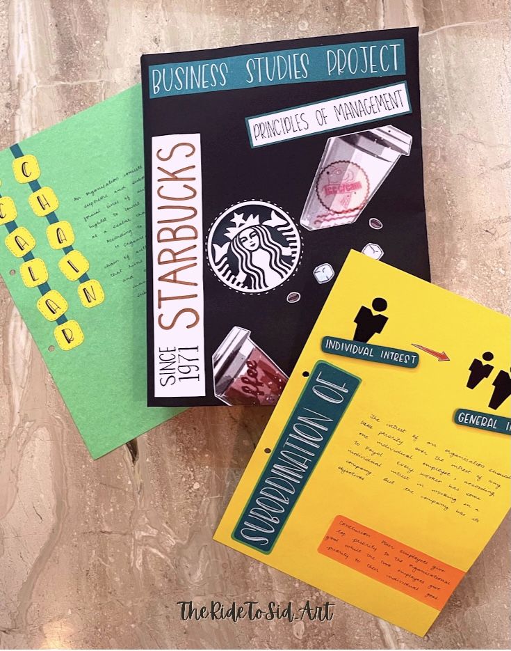 three books are sitting on the floor next to each other and one has a starbucks logo