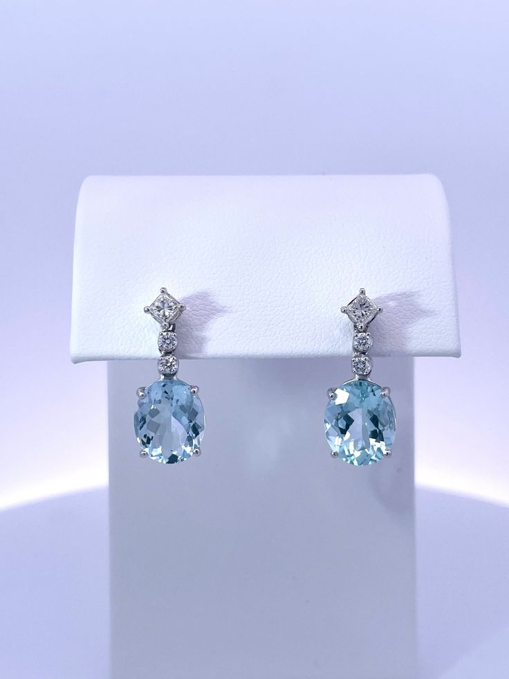 ✓ Stamped: 14K  ✓ Metal: Solid White Gold ✓ Aquamarine 11.00*7.00 millimeters 6 carats total weight. Loupe clean, light blue color. ✓ Diamonds 0.45 carats total weight H-I  SI1 Elegant Blue Gia Certified Diamond Earrings, Fine Jewelry Light Blue Earrings For Formal Occasions, Light Blue Fine Jewelry Earrings For Formal Occasions, Formal Light Blue Fine Jewelry Earrings, Blue Brilliant Cut Diamond Earrings For Formal Events, Formal Blue Topaz Earrings With Brilliant Cut, Fine Jewelry Aquamarine Earrings For Formal Occasions, Classic Blue Diamond Earrings For Formal Occasions, Formal Aquamarine Earrings Fine Jewelry