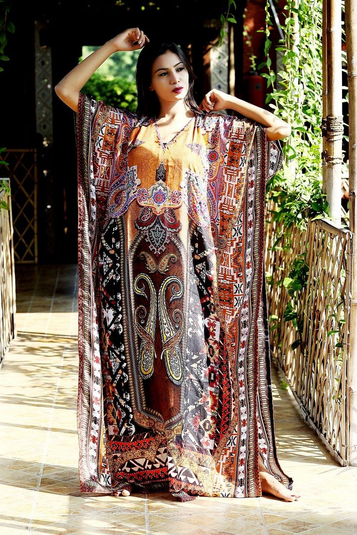 "Plus size silk caftan silk kaftan maxi dress silk dress Luxury kaftan Beach party kaftan Resort wear for women Designer kaftan 113 Bohemian Print Long Silk Kaftan Dress with Beautiful Crystal Work Lightweight kaftan Want to shop for a dress that is comfortable, classy and elegant at the same time? Then this alluring Silk Kaftan dress with glittering crystal work is the best choice for you. The minimal V neckline sets a perfect combination with sassy sidelines of the silk Kaftan dress. The beaut Bohemian Long Abaya For Beach Cover-up, Bohemian Multicolor V-neck Thobe, Brown Long Maxi Dress For Beach Cover-up, Silk Multicolor Kaftan For Eid, Multicolor Silk Kaftan For Eid, Bohemian Long Sleeve Abaya For Summer, Bohemian Long Sleeve Summer Abaya, Bohemian V-neck Printed Kaftan, Festival V-neck Kaftan