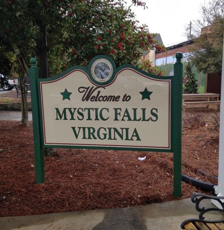 a welcome sign to mystic falls, virginia