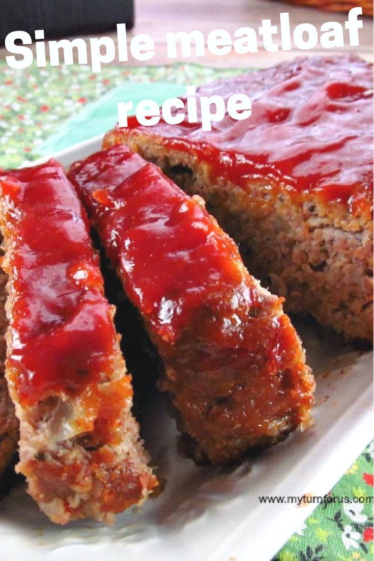 meatloaf with ketchup on a white plate and the words, simple meatloaf recipe