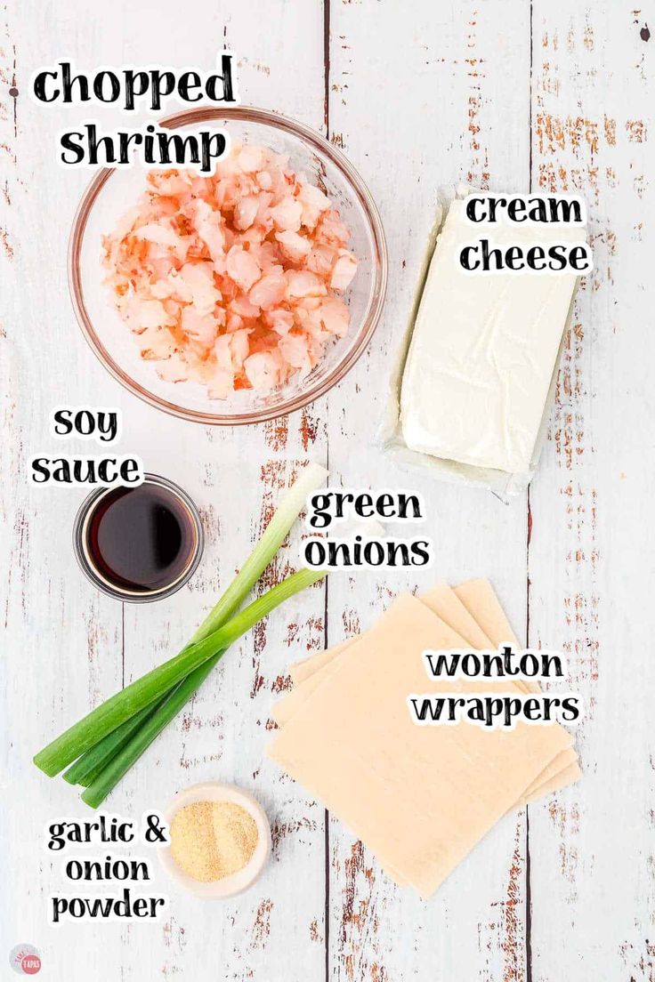 ingredients to make shrimp salad laid out on a white wooden table with text overlay