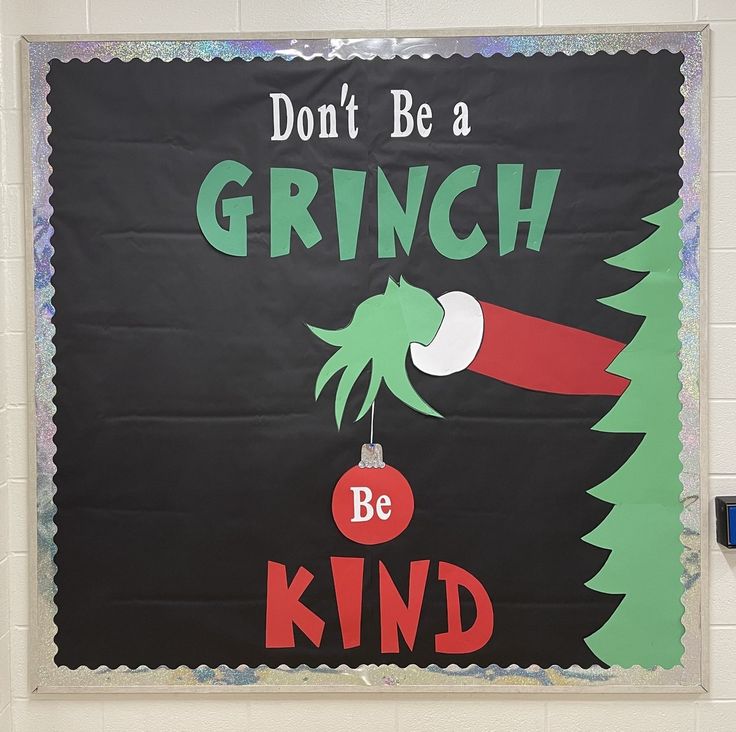 a bulletin board that says don't be a grinch be kind on it