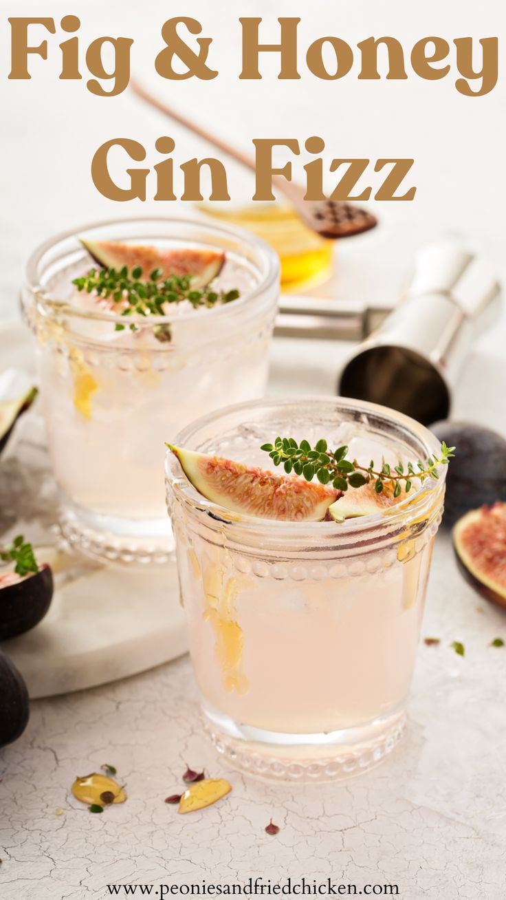 fig and honey gin fizz in small glasses on a table with other food items