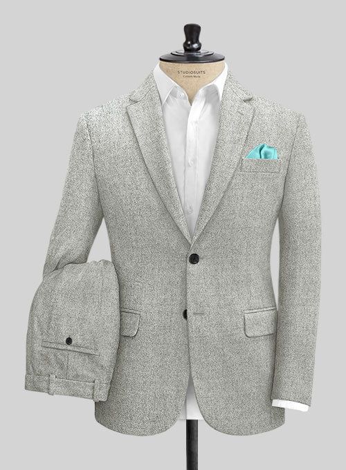 Impress everyone with our Italian Empire Gray Tweed suit that is sure to create a statement outfit to look absolutely amazing. Crafted from wool, the suit will make you want to dress up for all occasions like weddings, parties, or to work of your choice. 
 
 Look features a 2 button jacket with notch lapels, horn royal black buttons, single vent, two cuff buttons and two welted back pockets on trousers.  You can change the look during customization if required. 
 
 Lining: Viscose; Dry Clean. Italian Empire, Brown Tweed Suit, Grey Tweed Suit, Herringbone Jacket, Tweed Pants, J Black, Statement Outfit, Brown Tweed, Grey Tweed