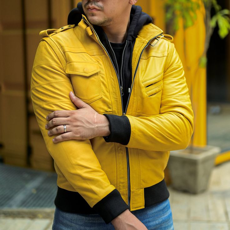 All-Weatherproof: Stay shielded with our leather motorcycle jacket’s superior weatherproof design. Crafted to withstand rain, wind, and chilly conditions, these leather jackets keep you warm. The ribbed cuffs and hem keep out the cold, ensuring optimal comfort during outdoor activities. High-Grade Leather: Made from premium high-grade leather, this mens leather jacket offers exceptional durability and a luxurious feel. The leather's natural texture not only provides a sophisticated appearance bu Winter Biker Jacket With Ykk Zipper For Motorcycling, Fitted Leather Biker Jacket For Outdoor, Hooded Leather Jacket For Winter Outdoor, Hooded Leather Jacket For Winter, Leather Jacket With Detachable Hood For Fall, Fall Leather Jacket With Detachable Hood, Leather Hooded Jacket For Outdoor, Hooded Leather Jacket For Cold Weather, Winter Hooded Leather Jacket