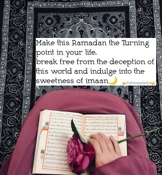 someone is writing in a book with a flower on the page and an islamic prayer