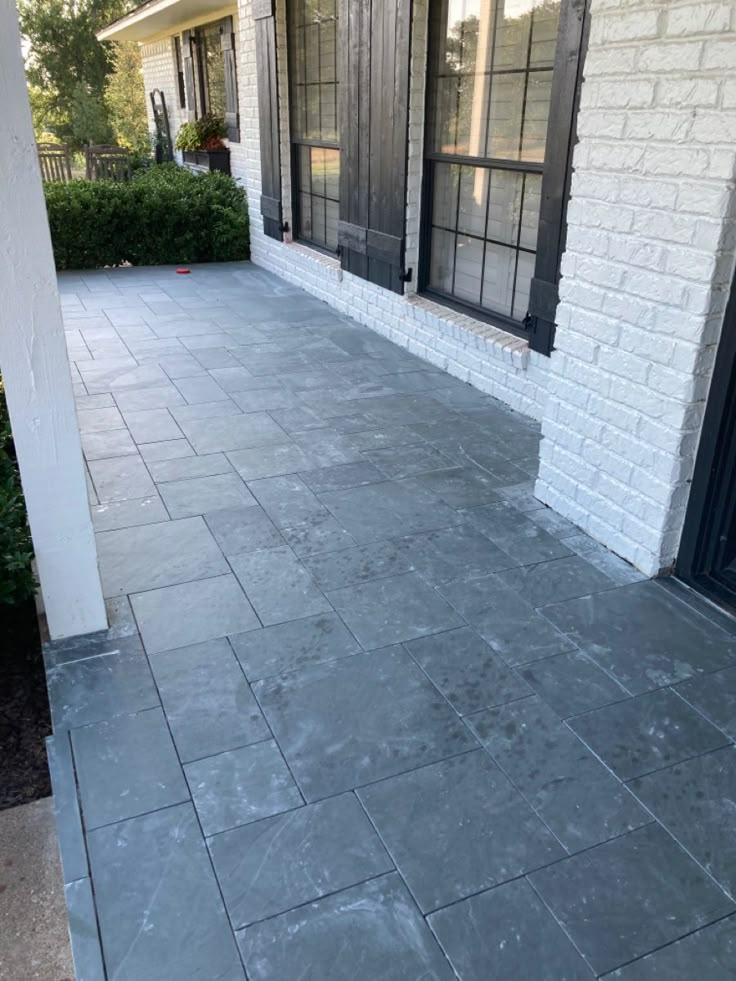 Porch flooring. Slate tile over cement Slate Gray Patio Pavers, Slate Tile Front Porch, Outdoor Slate Tile, Slate Tile Patio, Gray Slate Tile Bathroom, Slate Entryway Floor, Slate Tile Porch, Slate Front Porch, Front Porch Tile Ideas