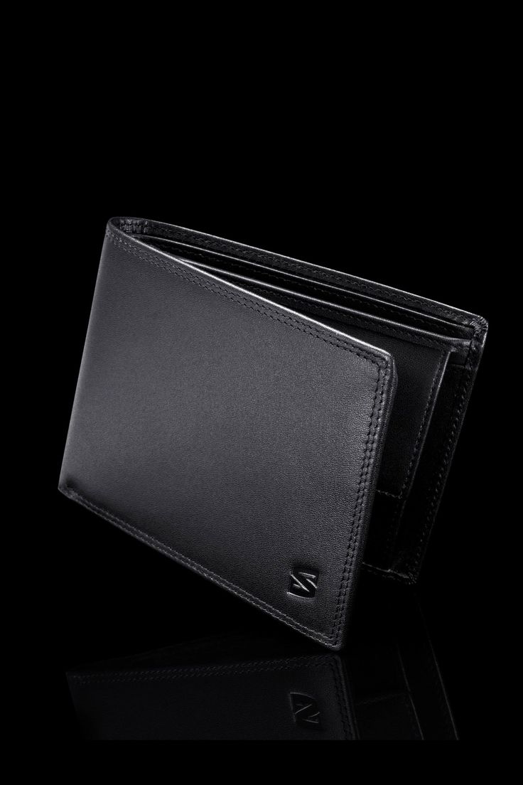 Men's black wallet by SERASAR. This wallet is made of genuine leather.- Material cow leather- Supplied in a gift box- 12 card slots- 2 banknote pockets- Coin pocket - ID card pocket- RFID security- Dimensions: 12,5 x 9,5 x 2,5 cm Elegant Tan Wallets For Business, Tan Rectangular Wallet For Business, Tan Rectangular Business Wallet, Modern Tan Wallet For Everyday Use, Modern Tan Wallets For Everyday Use, Elegant Tan Bifold Wallet, Elegant Everyday Tan Wallet, Black Bifold Wallet For Formal Occasions, Tan Bifold Wallet With Card Slots