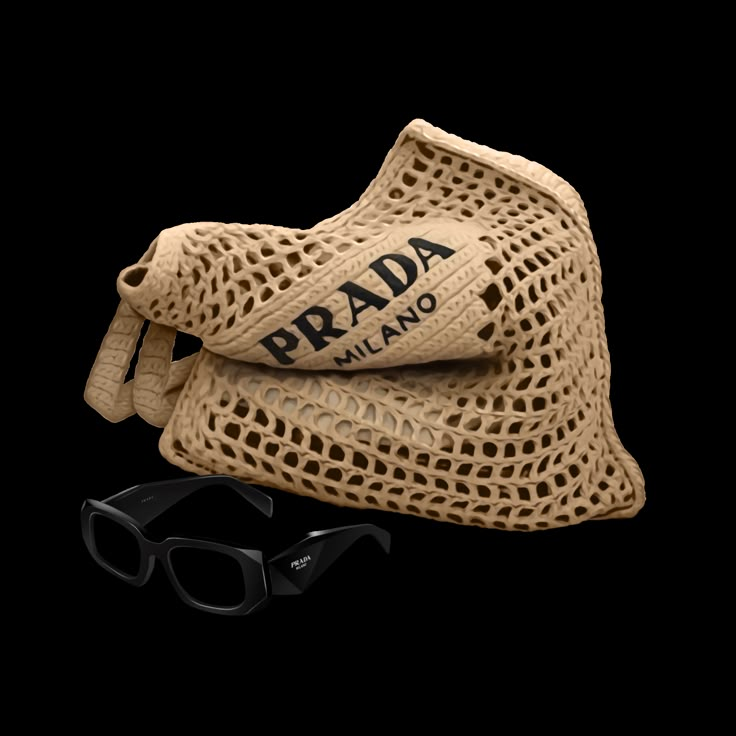 the prada sunglasses are on display next to a bag and pair of black glasses