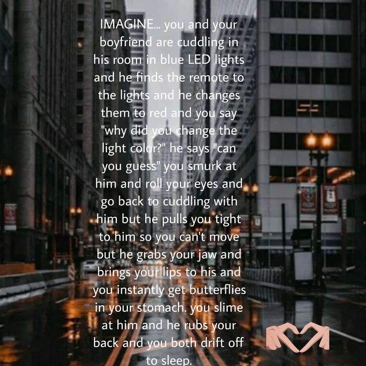 a poem written in the middle of a city street with tall buildings and lights on either side