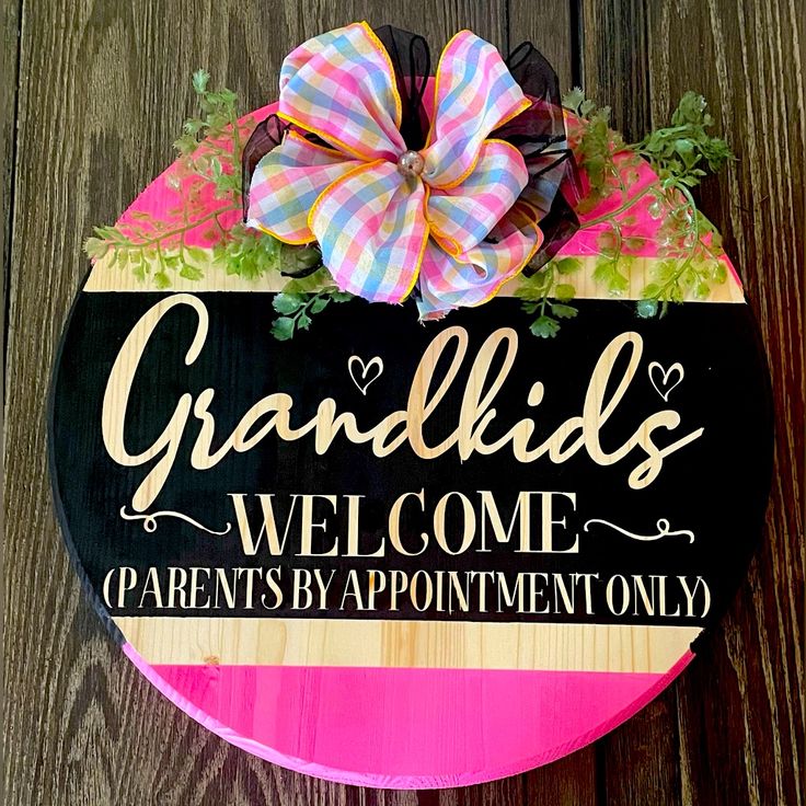 a wooden sign that says grandkids welcome to parents, stay appointment only with a bow on it