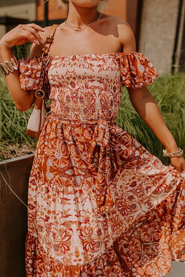 - Add a dash of whimsy into your wardrobe with this gorgeous dress! Its timeless design and beautiful print give it charming energy, making it perfect for patio brunches or sunset strolls. Stay fabulous in this stunning midi! - Airy material with an a pattern of different abstract floral materials featuring cinnamon, cream, pink, orange, and blue hues - An elastic square cut neckline - Short puff sleeves with elastic shoulders and elastic cuffs that can be worn off-shoulder - A stretchy smocked Chasing Sunsets, Concert Fashion, Essential Dress, Sweater Jumpsuit, Curve Dresses, Square Cut, Sweater Blouse, Blue Hues, Abstract Floral