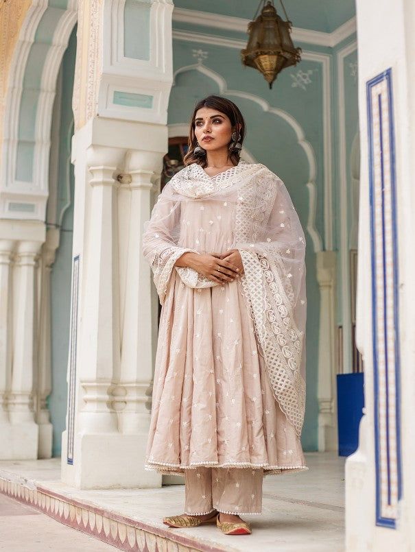 With the Onset of Monsoon, lets welcome in your wardrobe Pastel color collection Hairat. Pure Cotton Modal Anarkali with beautiful embroidery of fine motifs with same fabric pants adding elegance with Heavy Embroidered Organza Dupatta. Dry Clean Only Color: Grey Fabric: Kurta & Bottom - Cotton Dupatta - Organza Unique work: Machine embroidery Note: Length and sizes can be customised Length - Anarkali 48-52 Inches Pants 36-40 Inches Dupatta 2.5 mtr Available in other colors The product will be de Traditional Drape Mulmul Palazzo Set For Wedding, Elegant Chikankari Embroidery Palazzo Set For Navratri, Mulmul Anarkali Set For Wedding, Elegant Straight Kurta Sharara In Mulmul, Anarkali Churidar In Mulmul For Wedding, Bollywood Anarkali Set With Chikankari For Eid, Bollywood Anarkali Set With Chikankari Embroidery For Eid, Wedding Palazzo Set With Dupatta In Mulmul, Wedding Mulmul Palazzo Set With Dupatta