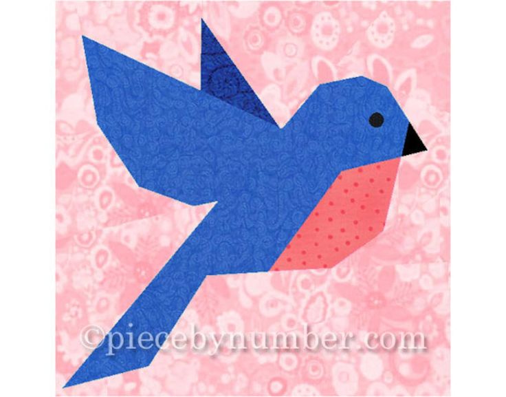 a blue bird is flying in the air with pink and white patterns on it's back