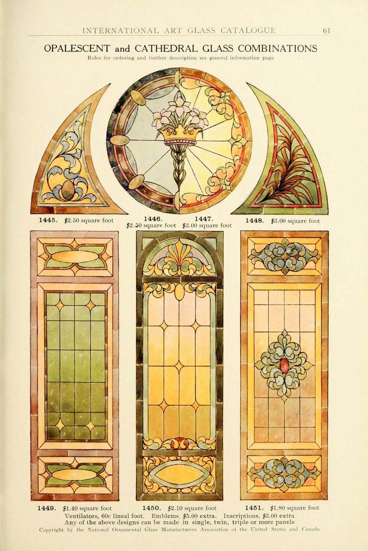 an old book with stained glass designs on the front and back pages, including two arched windows