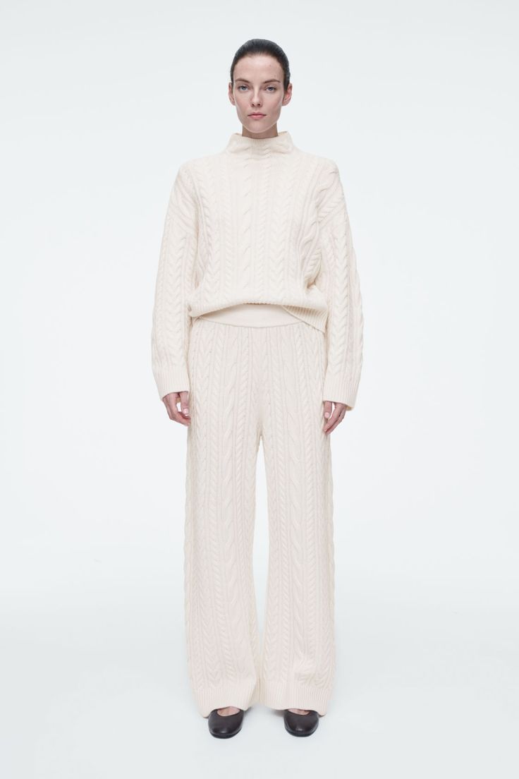 CABLE-KNIT WOOL PANTS - IVORY - Trousers - COS Casual Sporty Outfits, Belted Cape, Knit Trousers, Knitted Suit, Matching Sweaters, Funnel Neck Sweater, Cardigan Shirt, Wool Vest, Wool Trousers