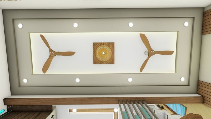 an overhead view of a living room with two ceiling fans on the wall and bookshelves