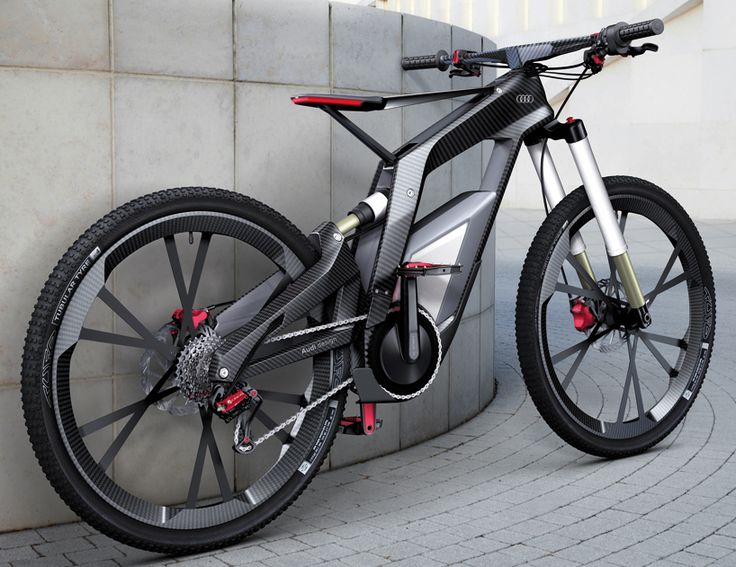 an electric bicycle parked next to a wall