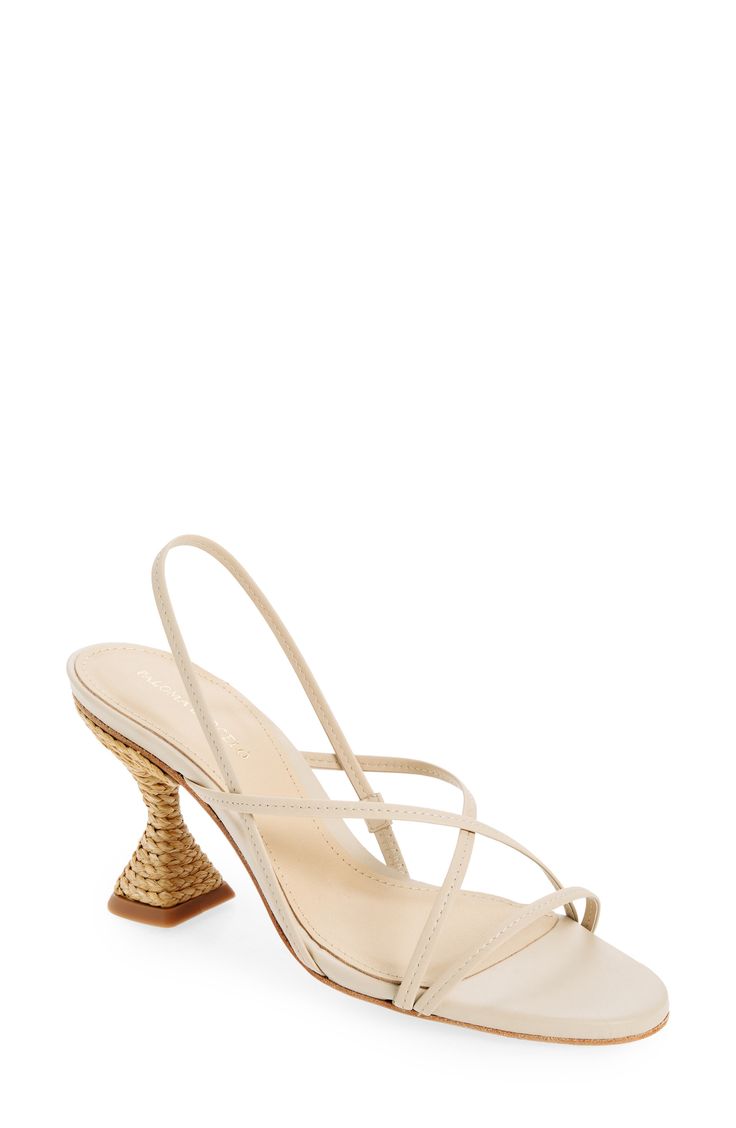 Slender leather straps distinguish a minimalist slingback sandal lifted by a raffia-wrapped flare heel for boho appeal. 3 1/2" heel (size 39) Elasticized slingback strap Leather upper, lining and sole Made in Spain Evening Slingback Sandals With Single Toe Strap For Summer, Chic Summer Slingback Pumps With Straps, Cream Slingback Sandals For Summer, Spring Slingback Sandals With Single Toe Strap, Beige Slingback Pumps For Summer Evenings, Elegant High Heel Slingback Sandals For Vacation, Chic Natural Heels With Open Heel, Chic Natural Open Heel Heels, Chic Natural Color Open Heel Heels