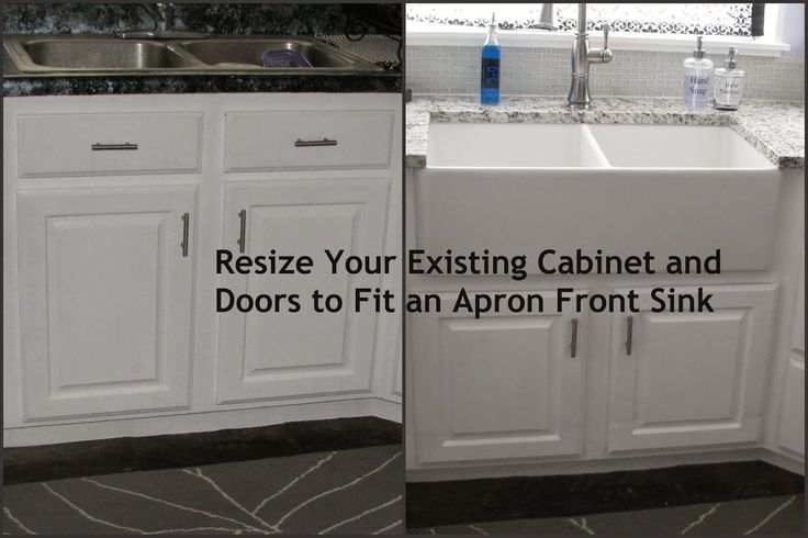 a kitchen with white cabinets and black counter tops next to a sink in the corner