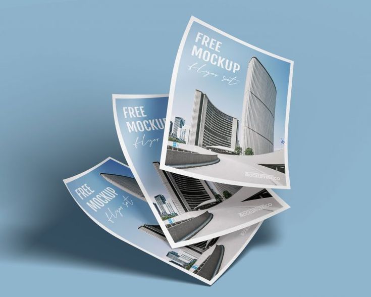 three free mockup brochures are stacked on top of each other in front of a blue background