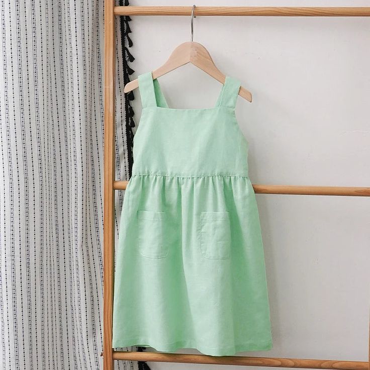 Add a touch of fun to your little one's summer wardrobe with our Bow Dress! Featuring adjustable shoulder straps and made from a blend of 70% cotton and 30% linen, this dress is perfect for sunny days. Get ready to bow down to this playful and stylish addition to your child's closet! Sleeveless Linen Dress, Mid Calf Dresses, Bow Dress, Lightweight Dress, Suspender Dress, Clothing Size Chart, Pocket Dress, Summer Cotton, Casual Girl